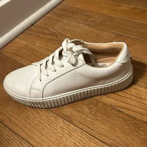 White Steve Madden sneakers.